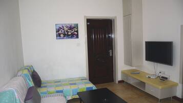 Suite, 1 Schlafzimmer | Wohnzimmer | Fernseher