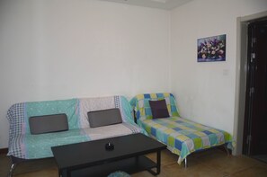 Suite, 1 Schlafzimmer | Wohnzimmer | Fernseher