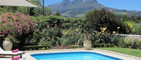 Lavender Cottage | Pool | Outdoor pool, pool umbrellas, sun loungers
