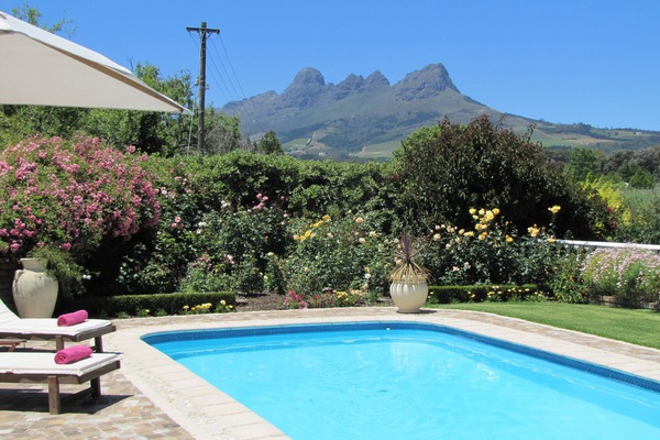 Lavender Cottage | Pool | Outdoor pool, pool umbrellas, sun loungers
