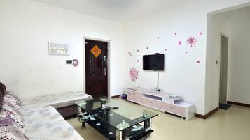 Suite, 1 Schlafzimmer | Wohnzimmer | Fernseher