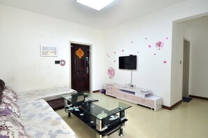 Suite, 1 Schlafzimmer | Wohnzimmer | Fernseher