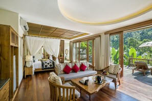 Premier Pool Villa - with Heated Pool | Living room | 42-inch LED TV with cable channels, TV - The Kayon Jungle Resort (Payangan)