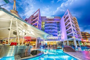 Outdoor pool, pool umbrellas, sun loungers