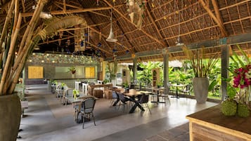 Breakfast, lunch served; local and international cuisine, pool views