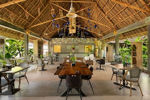 Breakfast, lunch served; local and international cuisine, pool views