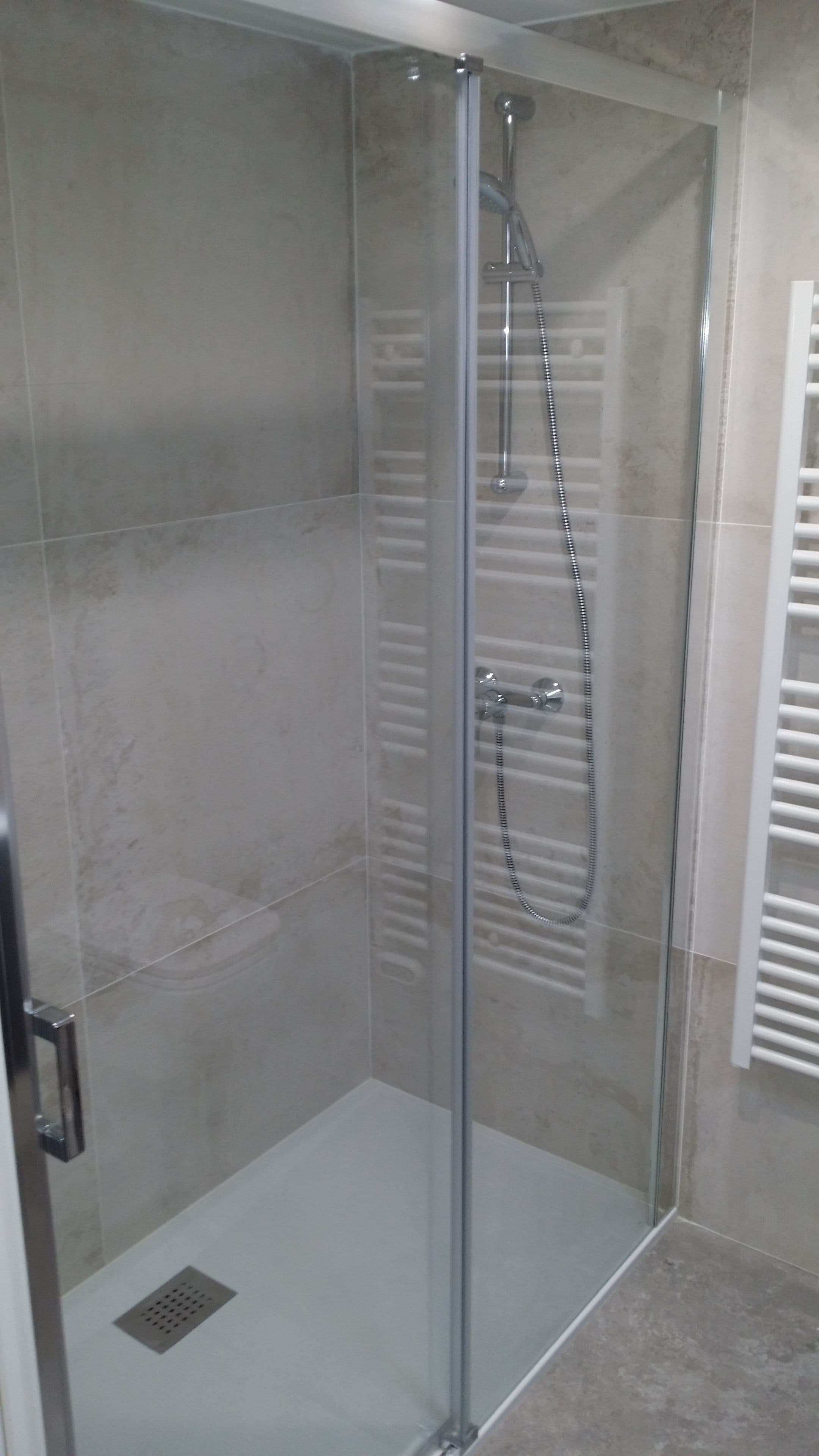 classic studio, 1 queen bed | bathroom shower