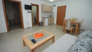 Appartement, 1 chambre, vue mer | Coin séjour