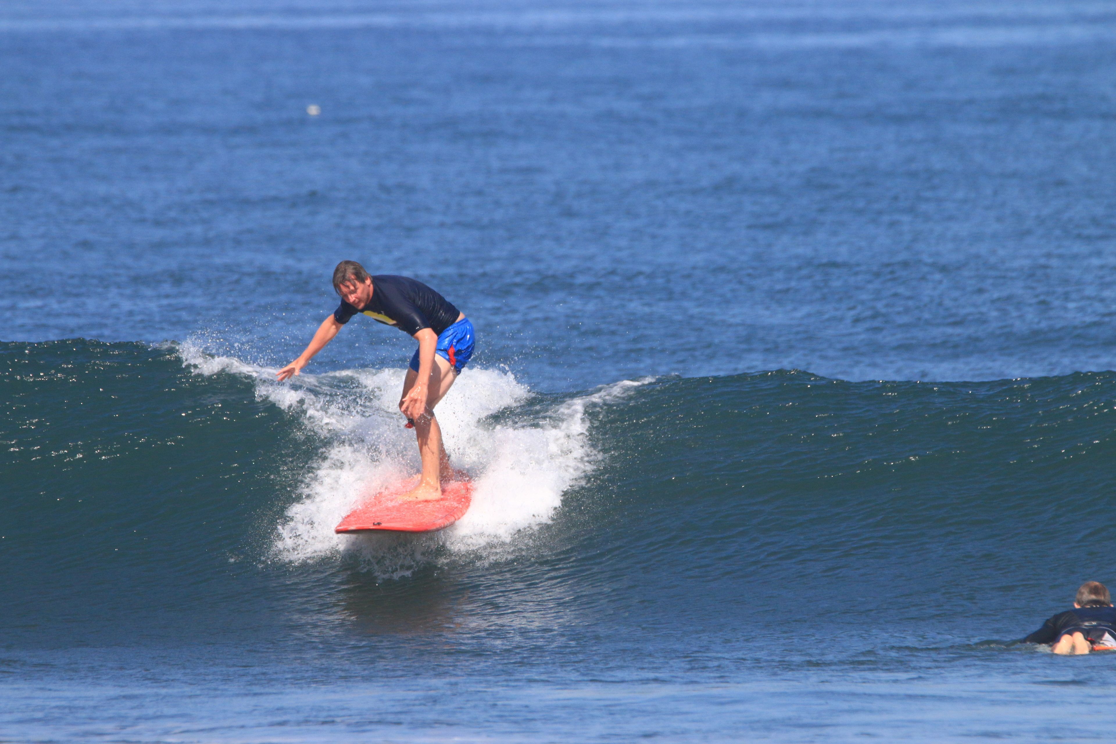 A person surfing on a wave.