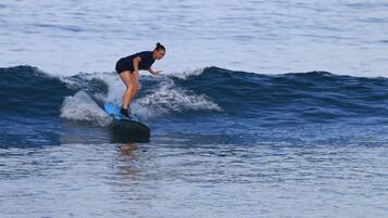 A person surfing on a wave.