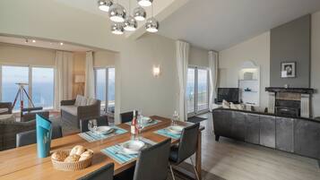 Flat-screen TV, video-game console, DVD player, iPod dock