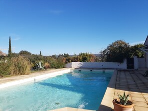 Outdoor pool, pool umbrellas, pool loungers