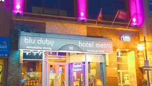A hotel with a prominent 'hotel metro' sign and a 'blu dubu' dining establishment. - Metro Inn (Ranchi)