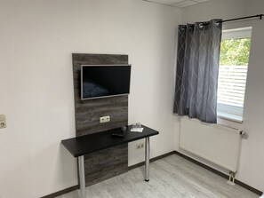 Chambre Double ou avec lits jumeaux | Télévision