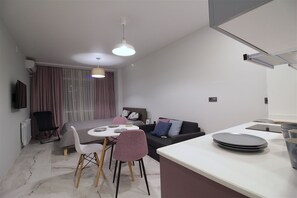Studio, Strandblick | Wohnbereich | Flachbildfernseher