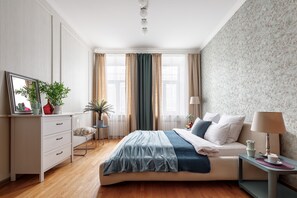 Premium bedding, blackout curtains, soundproofing, iron/ironing board