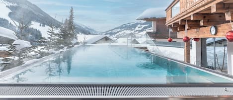 Outdoor pool, open 3:00 PM to 7:00 PM, pool umbrellas, sun loungers