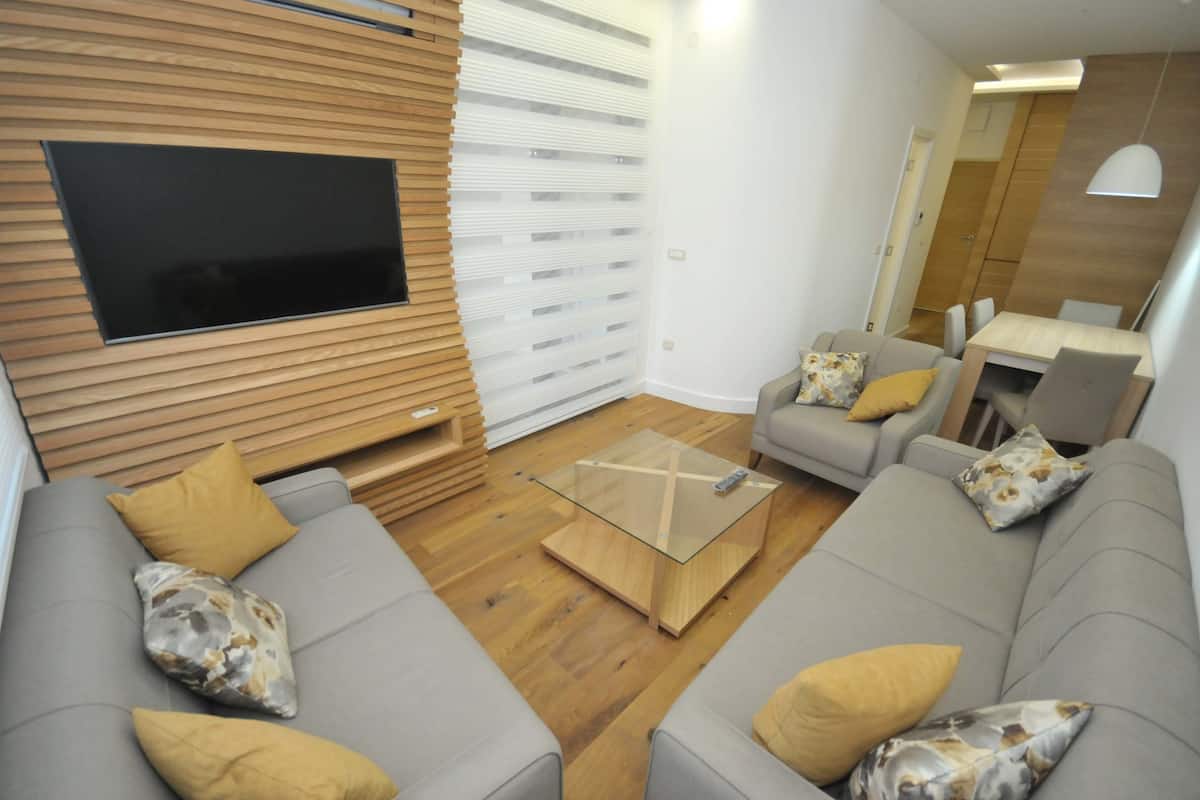 Flat-screen TV, pay movies