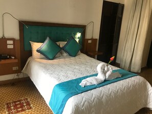 Suite, Private Bathroom, Garden View | In-room safe, desk, iron/ironing board, free WiFi