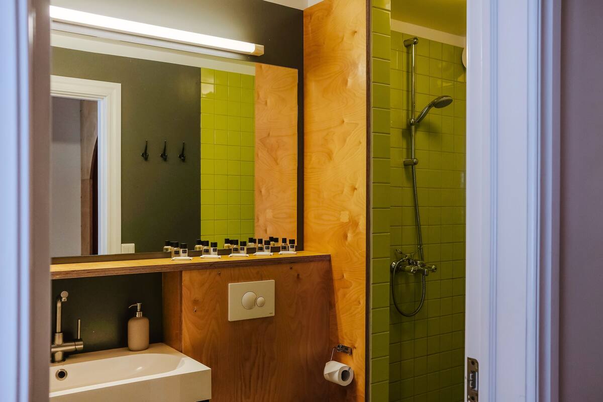 superior triple room, private bathroom | bathroom | shower, towels