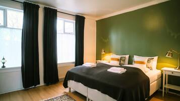 Apartment, 2 Bedrooms, Ground Floor | Desk, blackout drapes, iron/ironing board, free cribs/infant beds