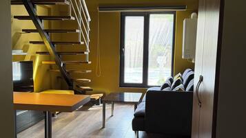 Classic Duplex | Living area | 42-inch LED TV with satellite channels