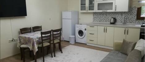 Apartment | Private kitchenette | Fridge, microwave, stovetop, electric kettle