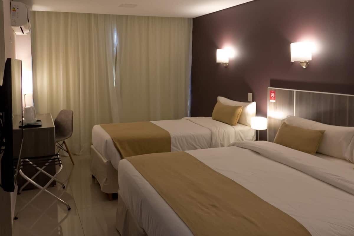 Premium bedding, down duvets, in-room safe, desk