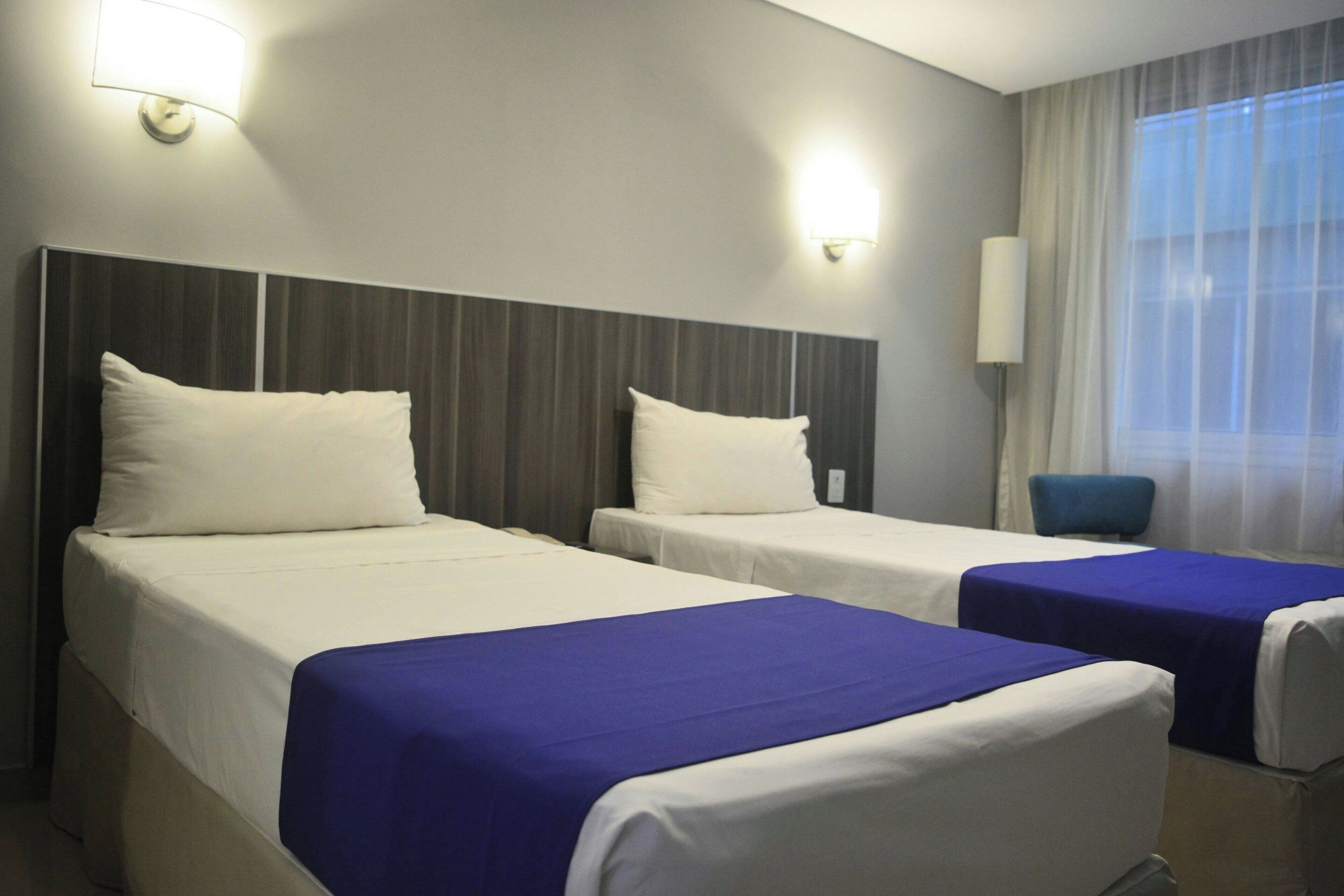 Premium bedding, down duvets, in-room safe, desk