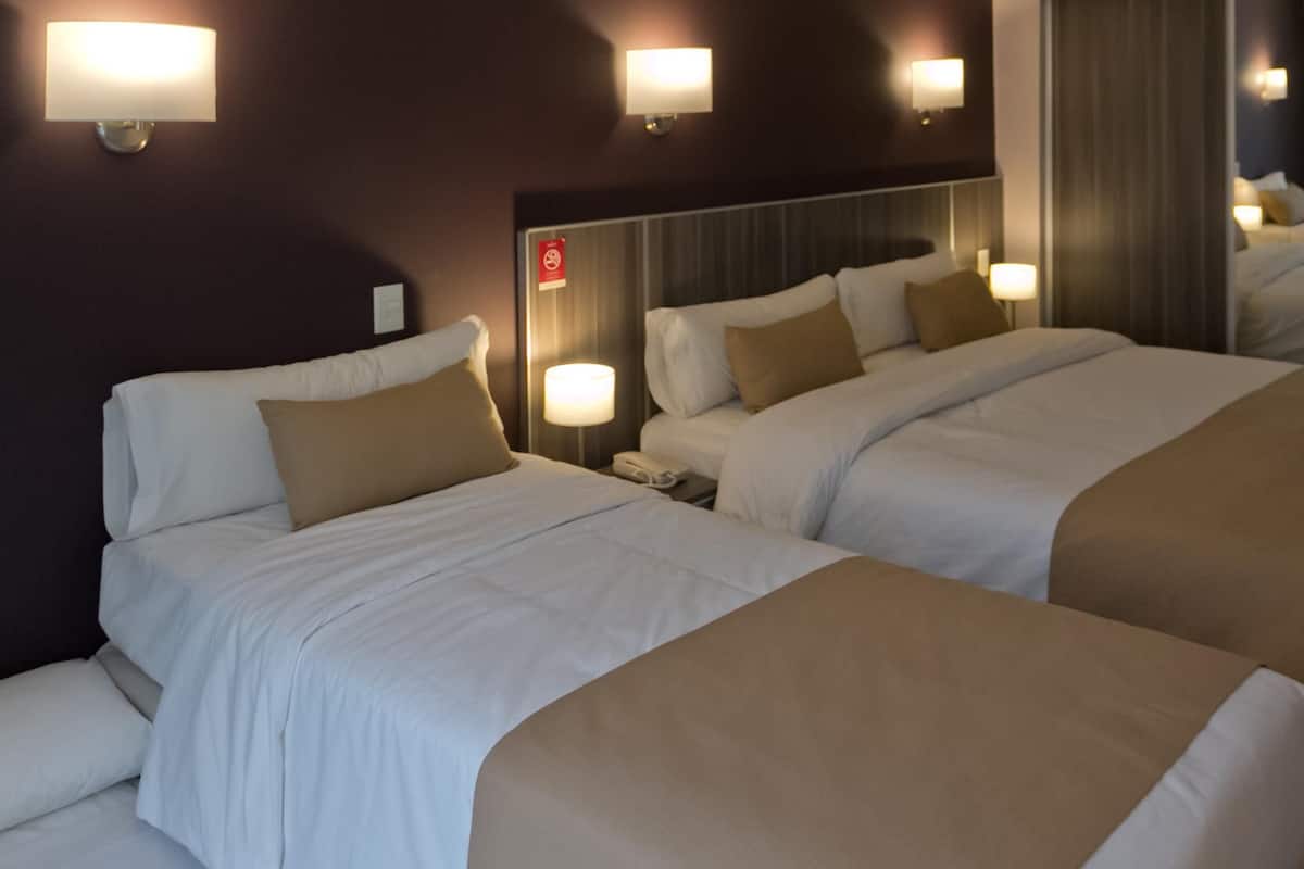Premium bedding, down duvets, in-room safe, desk