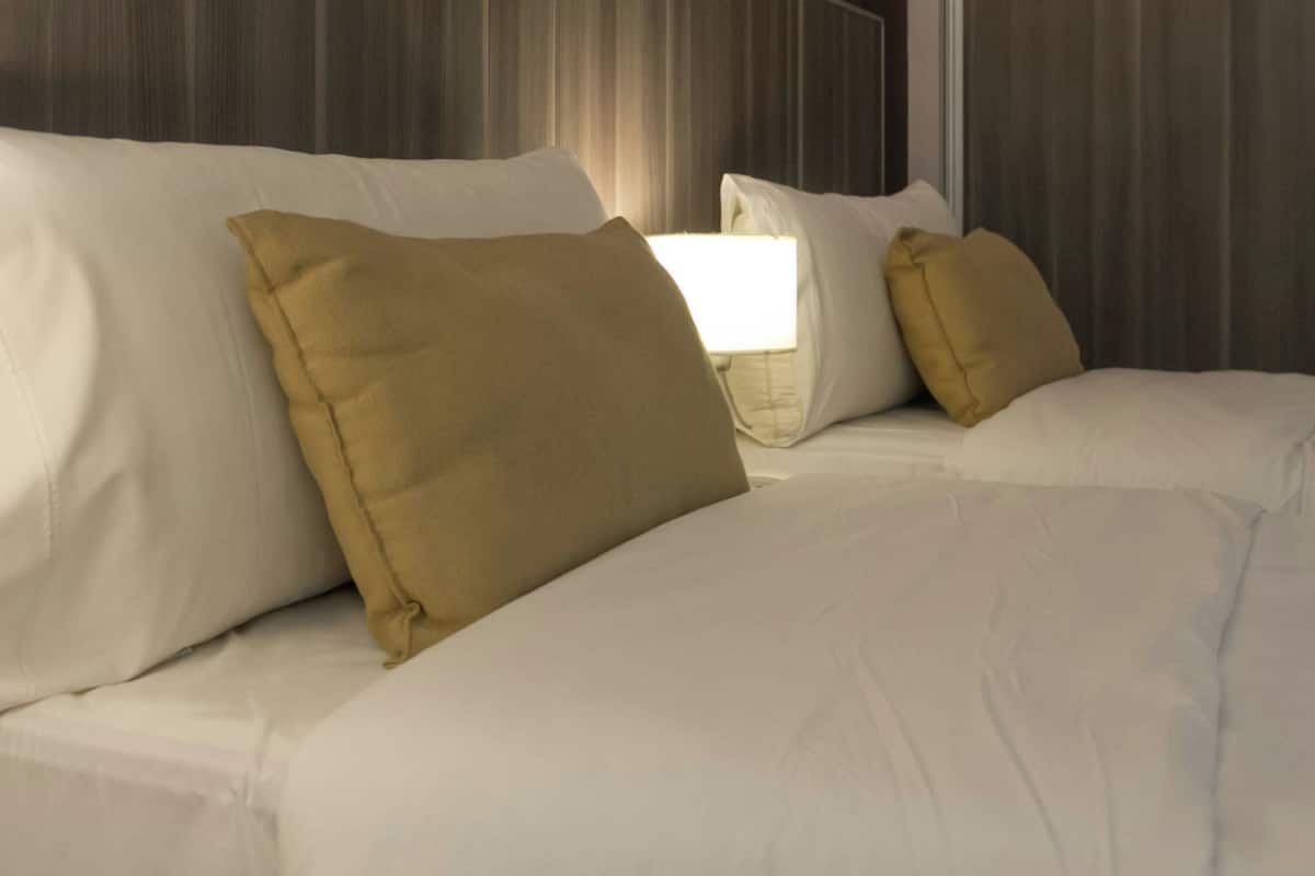 Premium bedding, down duvets, in-room safe, desk