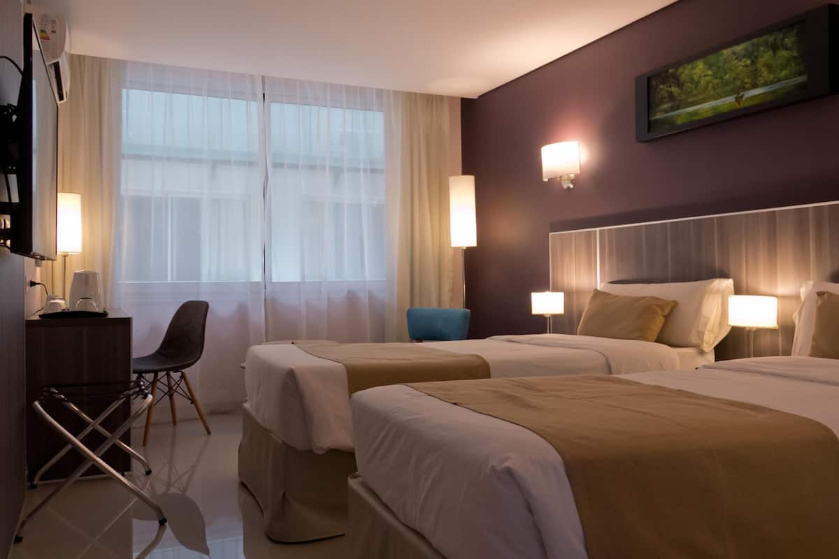 Premium bedding, down duvets, in-room safe, desk