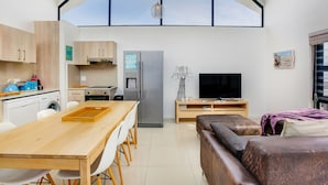 Apartment, 2 Bedrooms | Private kitchen | Coffee/tea maker, full-size fridge, microwave, oven - Azure 201 On Big Bay (Cape Town)