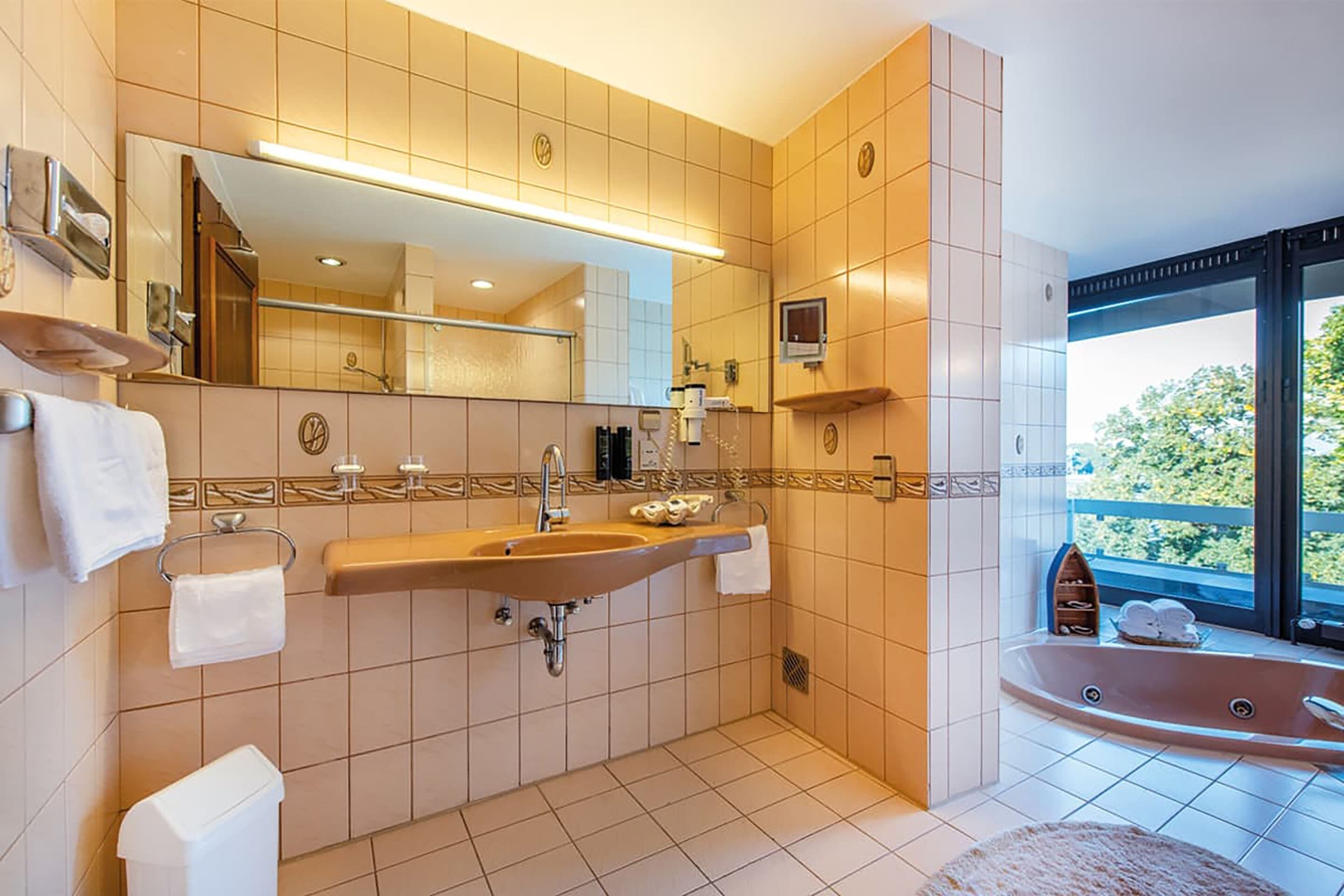 panoramic studio suite | bathroom | separate bathtub and shower, deep-soaking bathtub, bathrobes, slippers