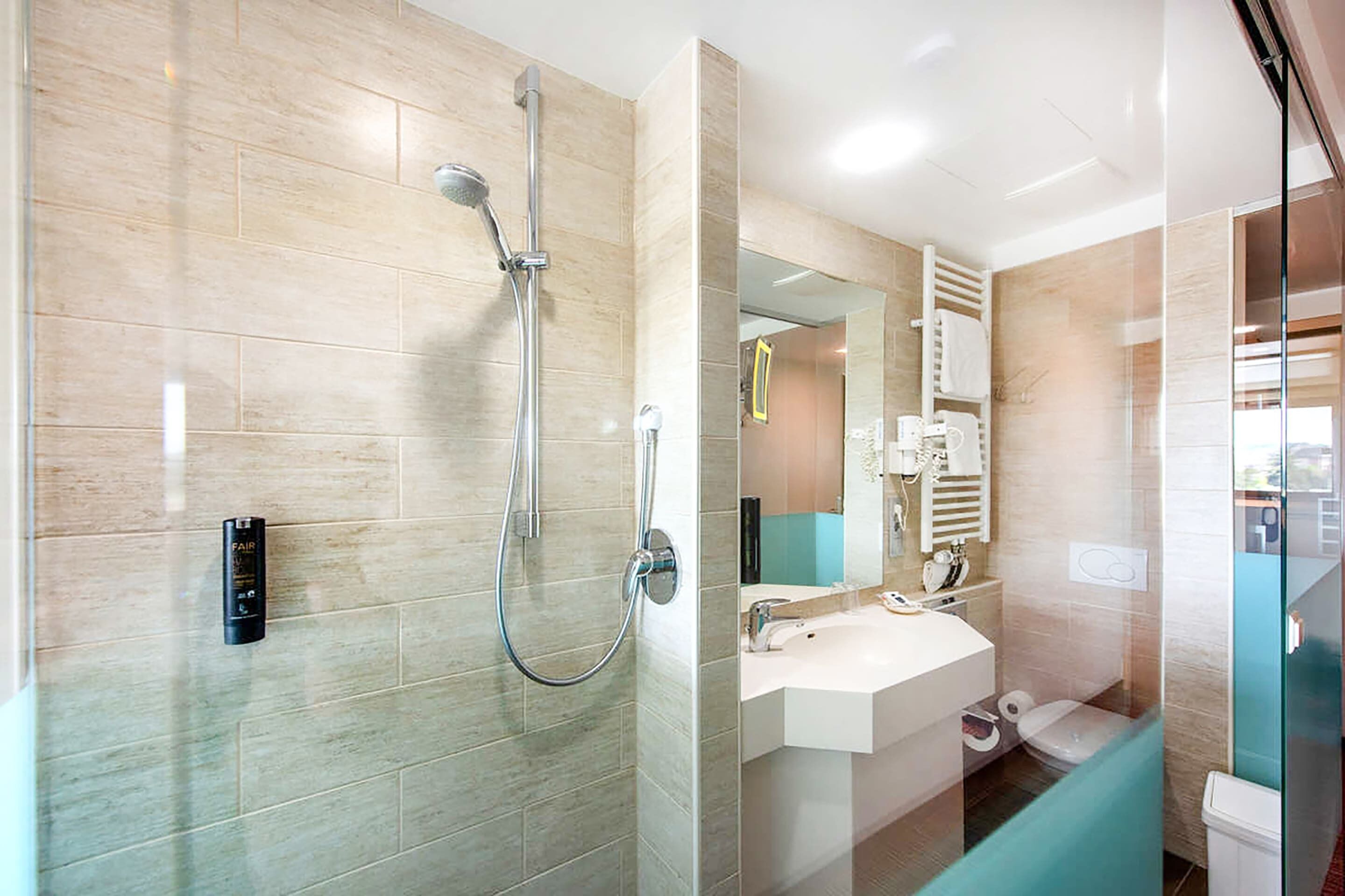 superior single room | bathroom | separate bathtub and shower, deep-soaking bathtub, bathrobes, slippers