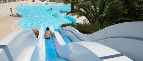 Seasonal outdoor pool, open 10 AM to 8 PM, pool umbrellas, pool loungers