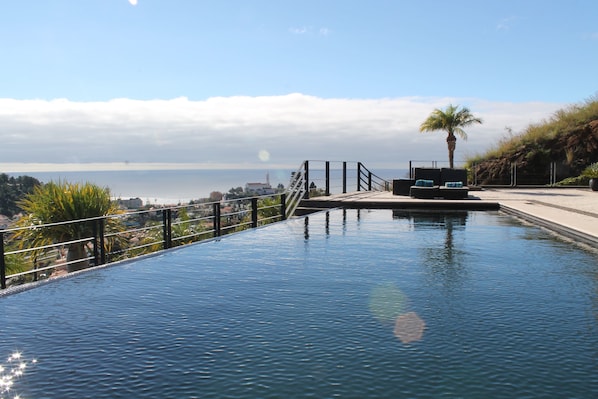 Outdoor pool, pool umbrellas, pool loungers