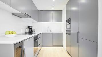 Apartment, 1 Bedroom, Non Smoking | Private kitchen | Full-size fridge, microwave, oven, stovetop