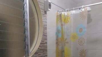 Shower, towels, soap, toilet paper