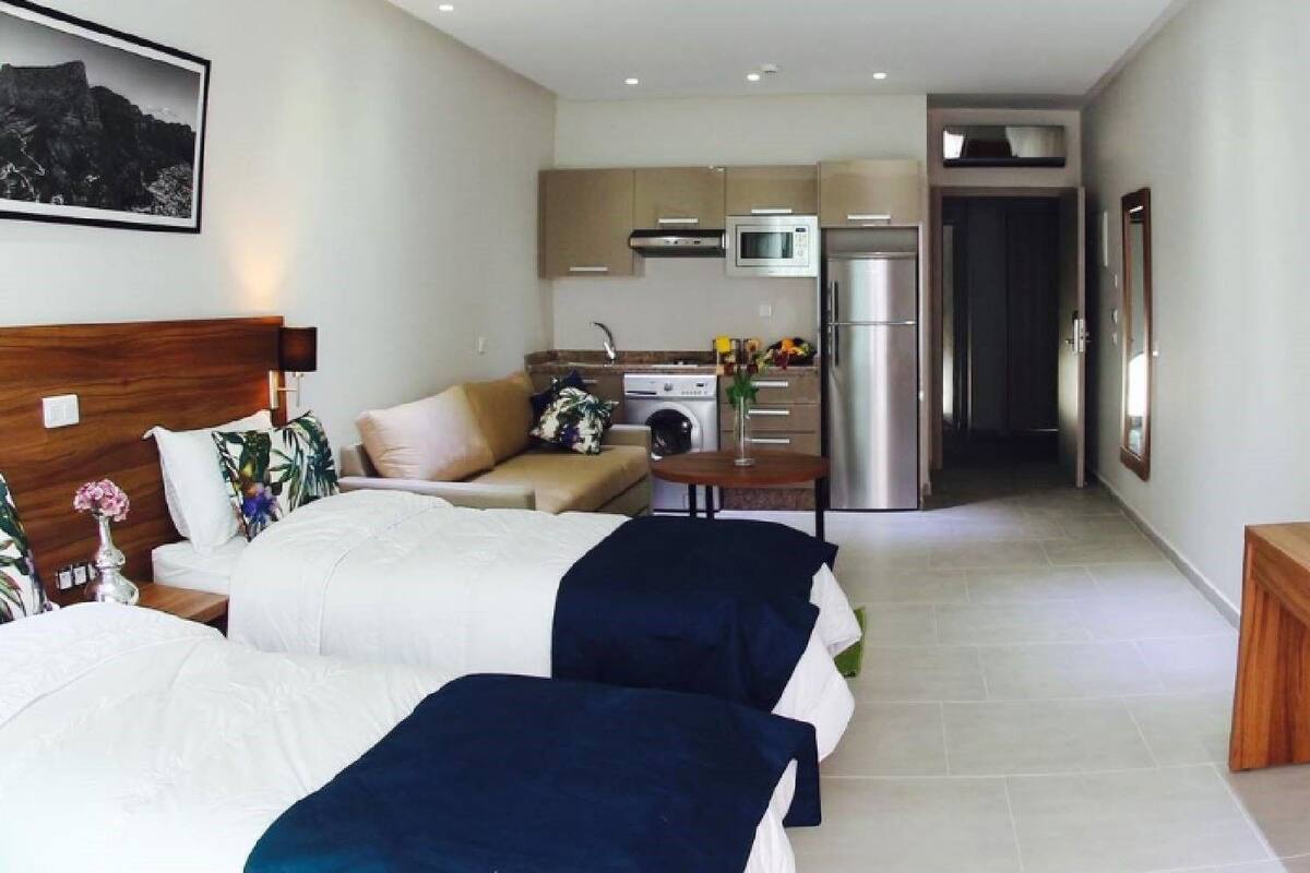 Chambre avec kitchenette | Premium bedding, in-room safe, desk, blackout curtains