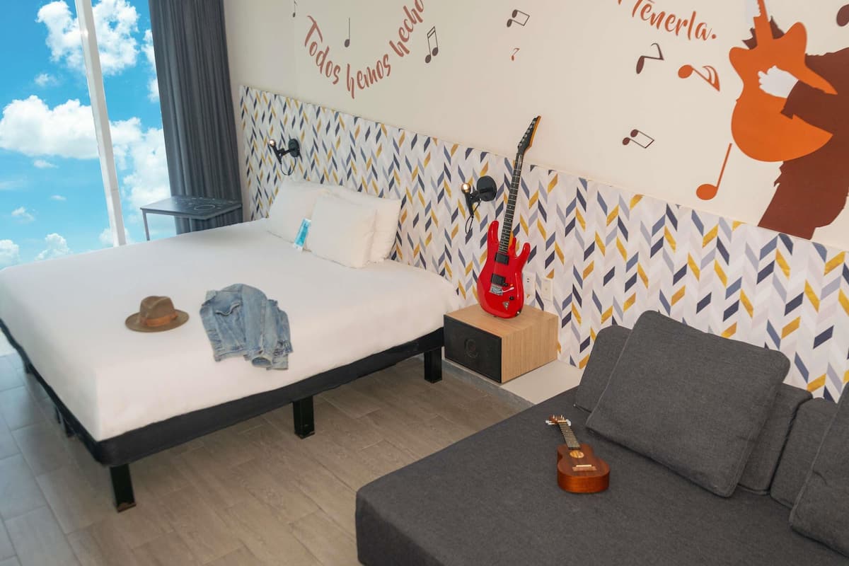 Suíte, 1 cama King e sofá-cama | Cofres nos quartos, escrivaninha, quartos à prova de som, berços grátis