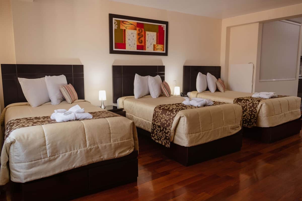 standard quadruple room, multiple beds | premium bedding, minibar, desk, laptop workspace