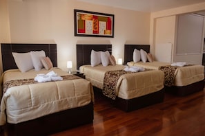 Standard Quadruple Room, Multiple Beds | Premium bedding, minibar, desk, laptop workspace
