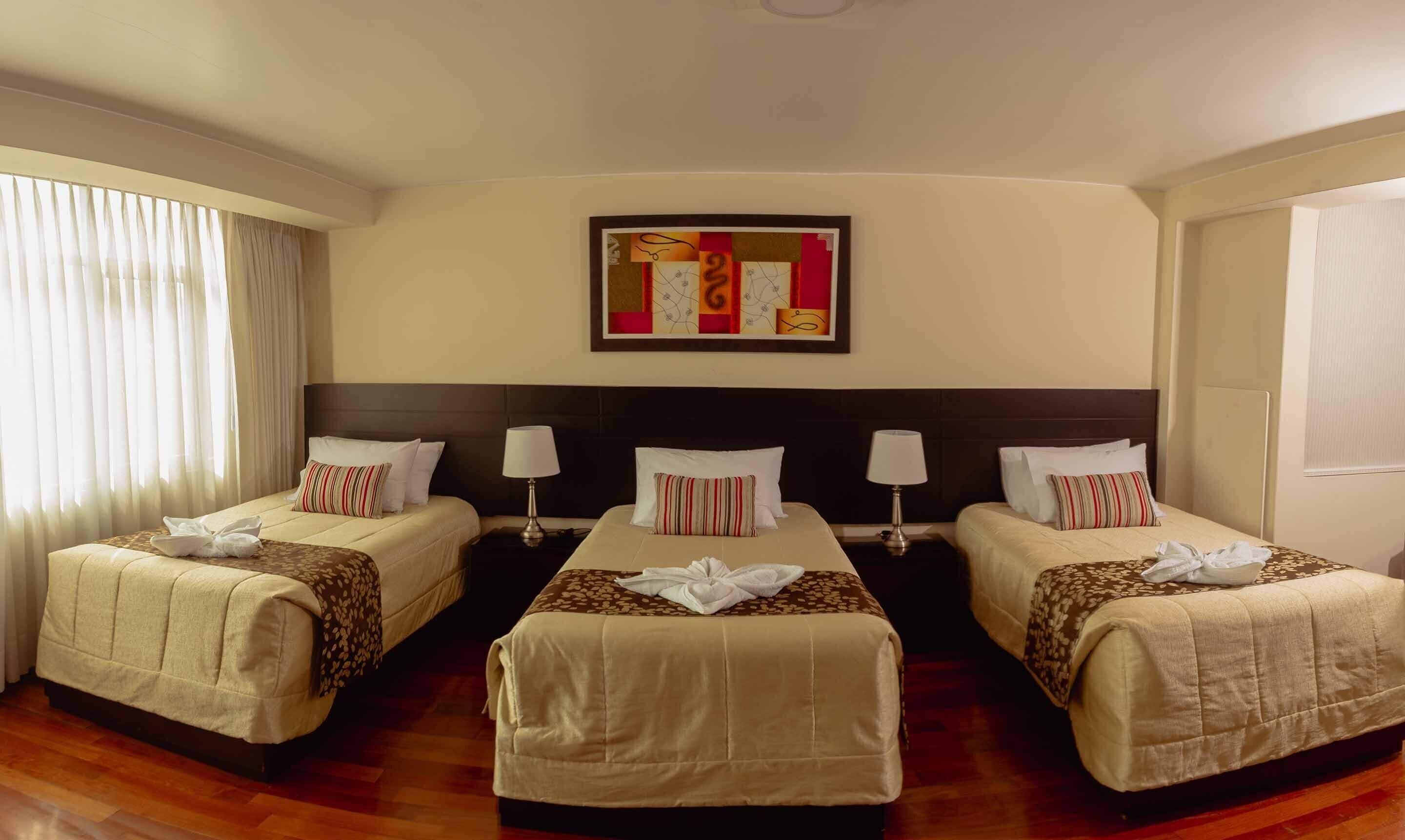 family triple room, 1 bedroom | premium bedding, minibar, desk, laptop workspace