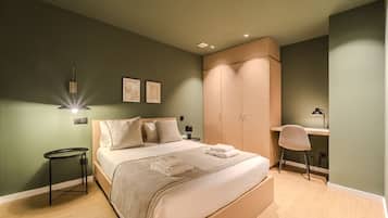 2 chambres, coffre-fort, fer et planche à repasser