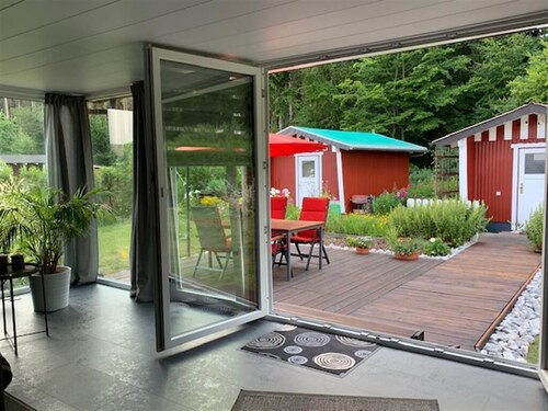 Wooden house with large garden and sauna "dogs welcome" 
