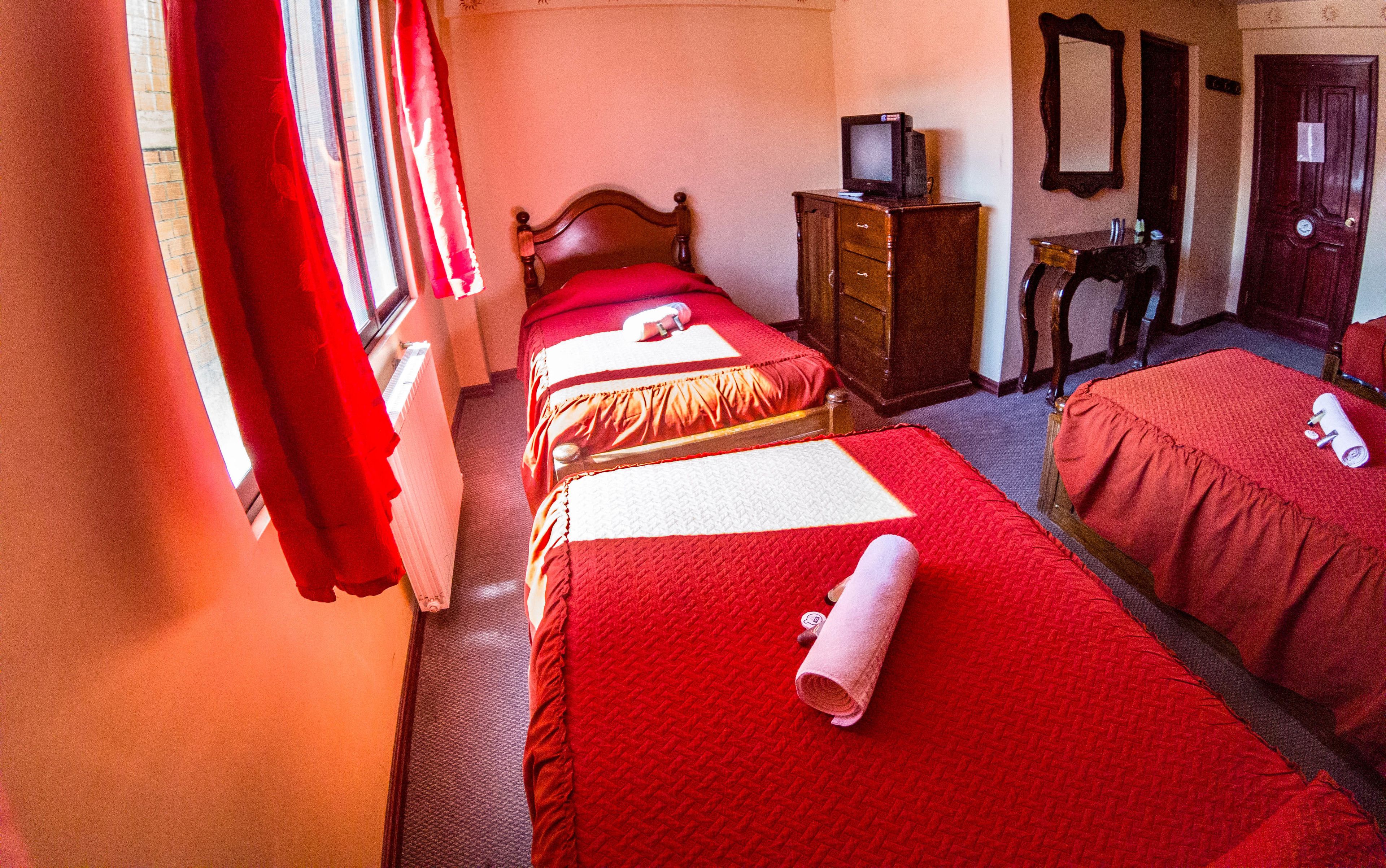 standard quadruple room, multiple beds | down duvets, free wifi