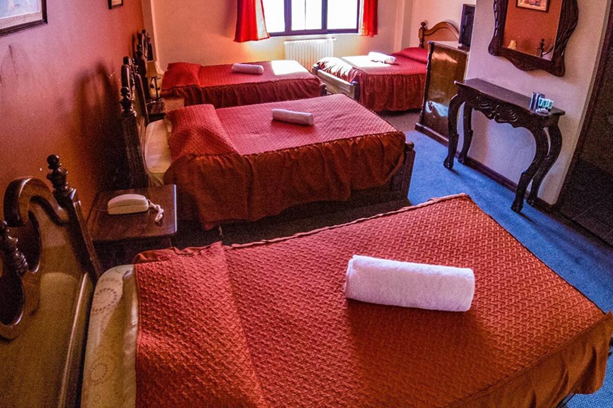 standard quadruple room, multiple beds | down duvets, free wifi