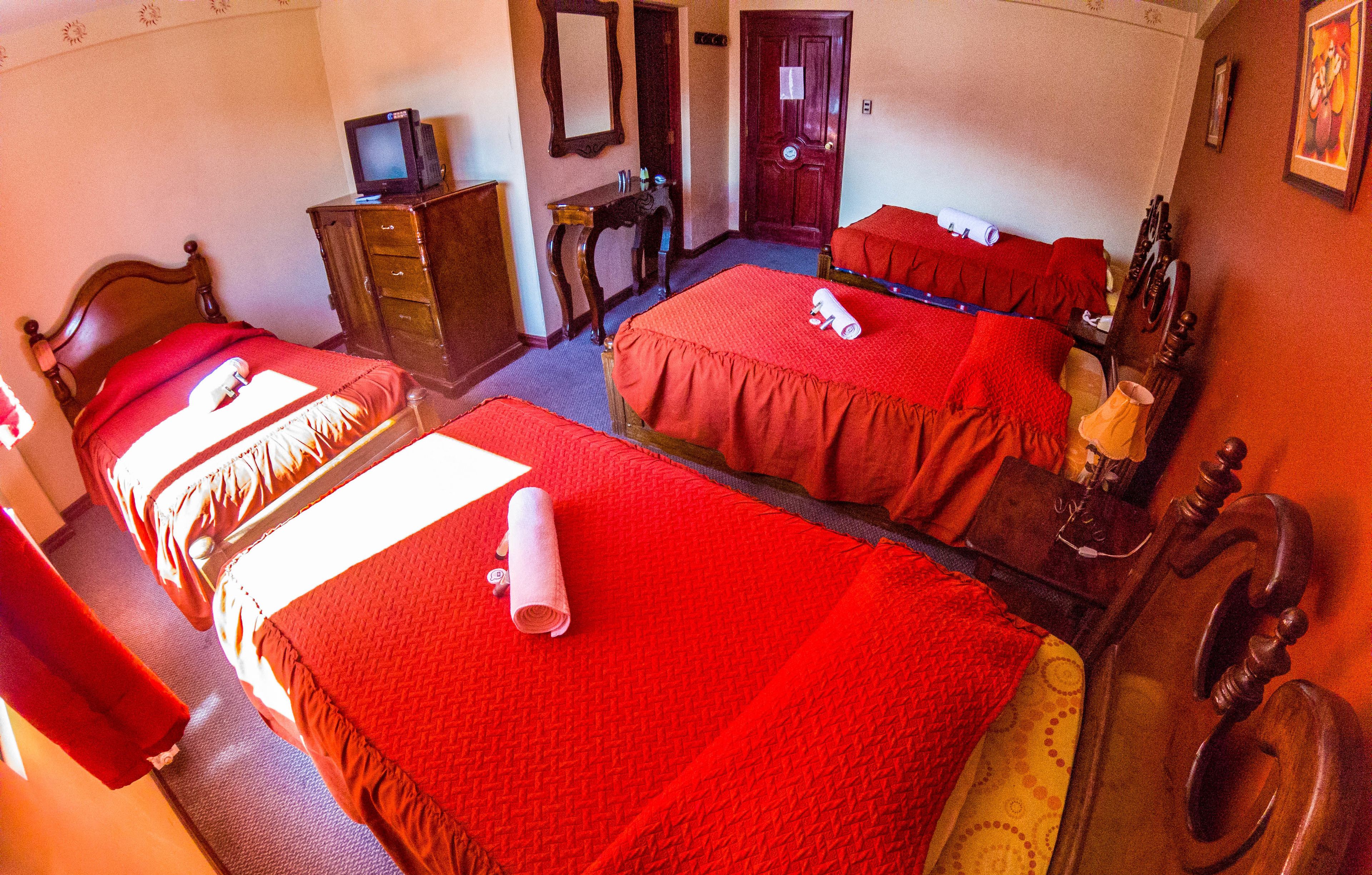 standard quadruple room, multiple beds | down duvets, free wifi