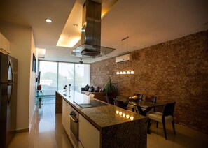 Condo | Private kitchen | Full-size fridge, microwave, oven, stovetop